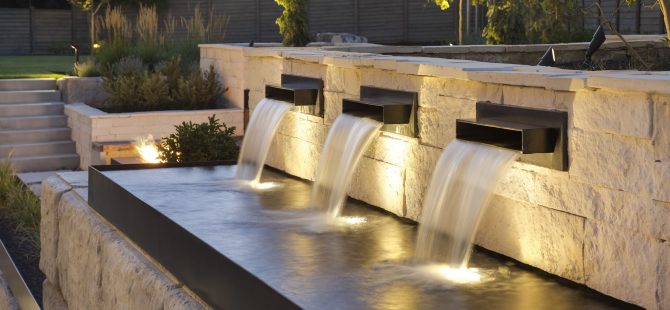 Stone retaining wall and mini pool with fountains